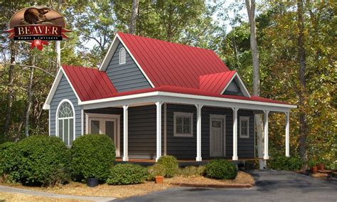 picture house with red metal roof and dark grey siding|red metal roof house ideas.